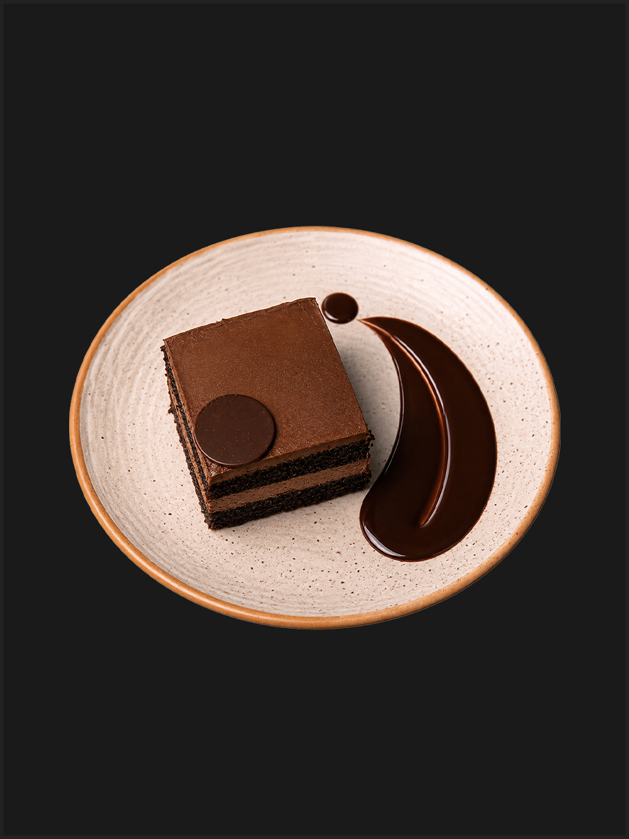 Chocolate Mousse layered cake with chocolate sauce