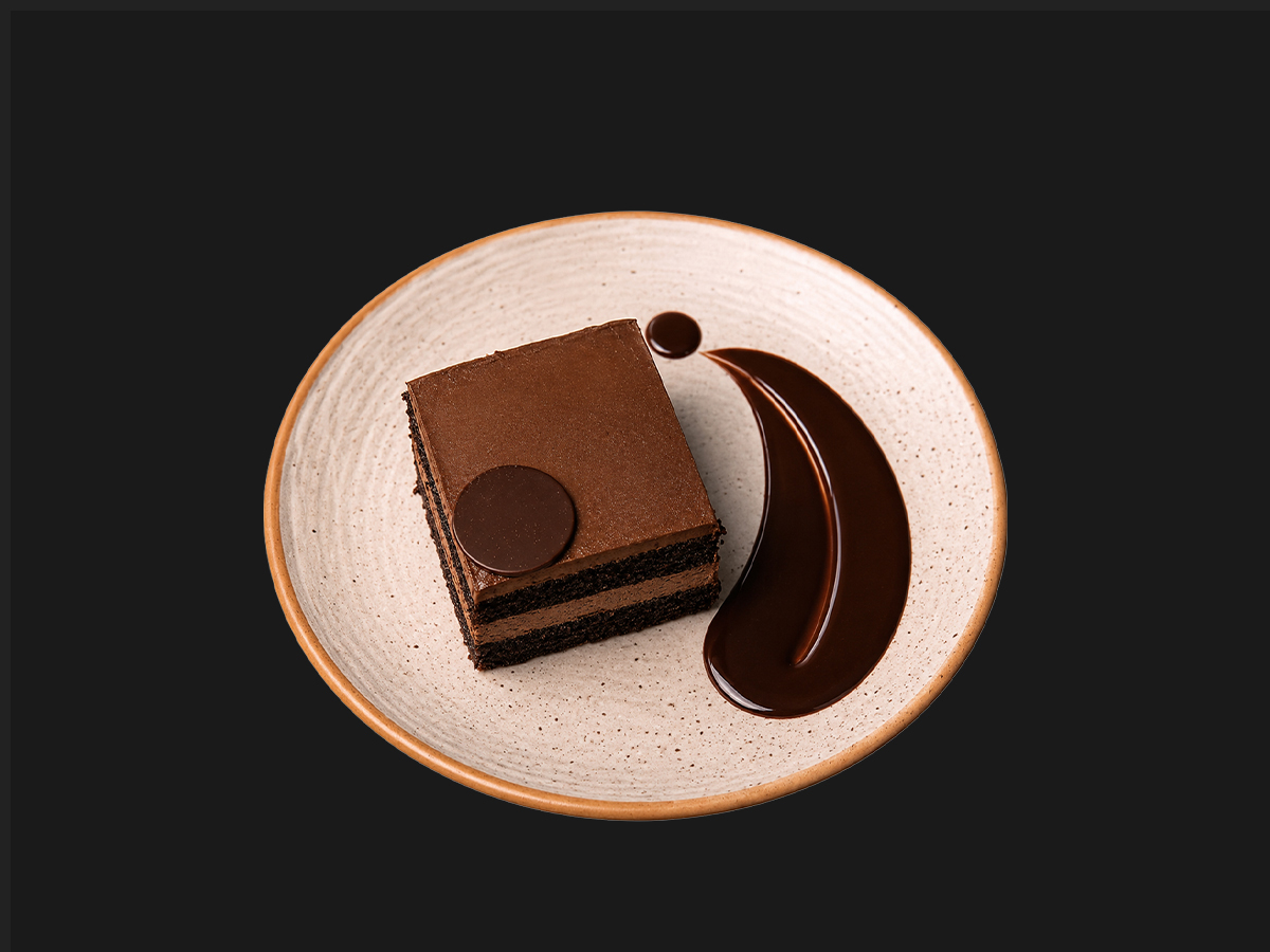 Chocolate Mousse layered cake with chocolate sauce