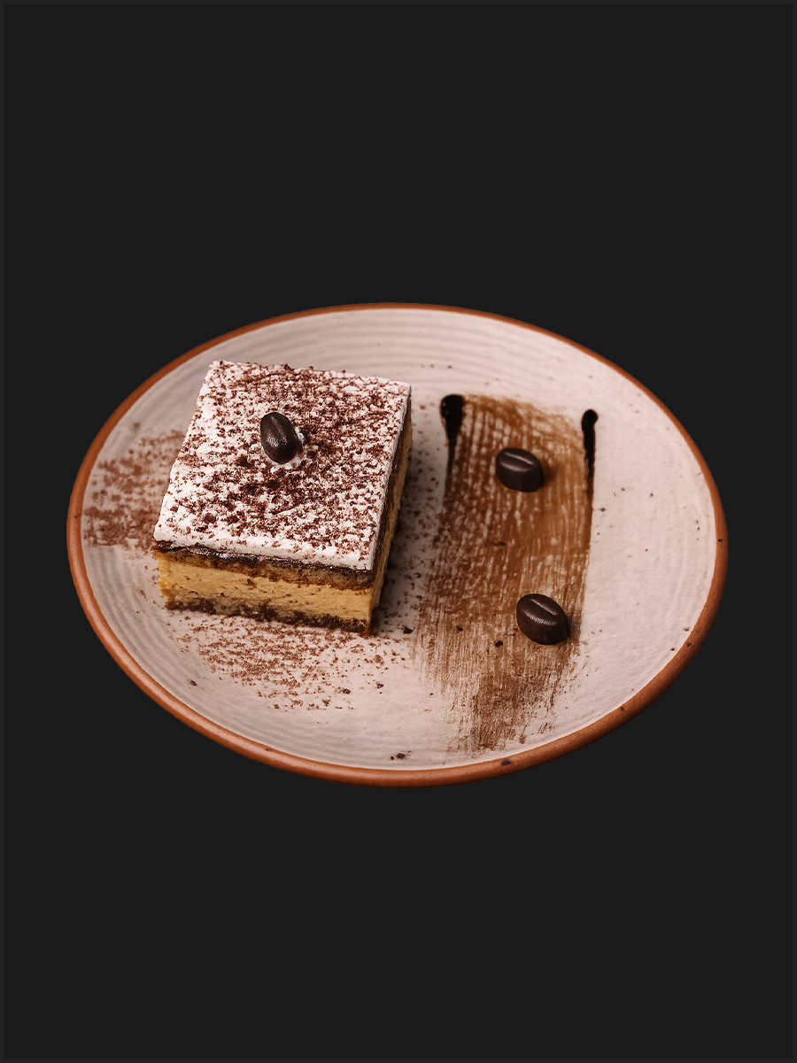 Classic Tiramisu with cocoa dust and coffee beans