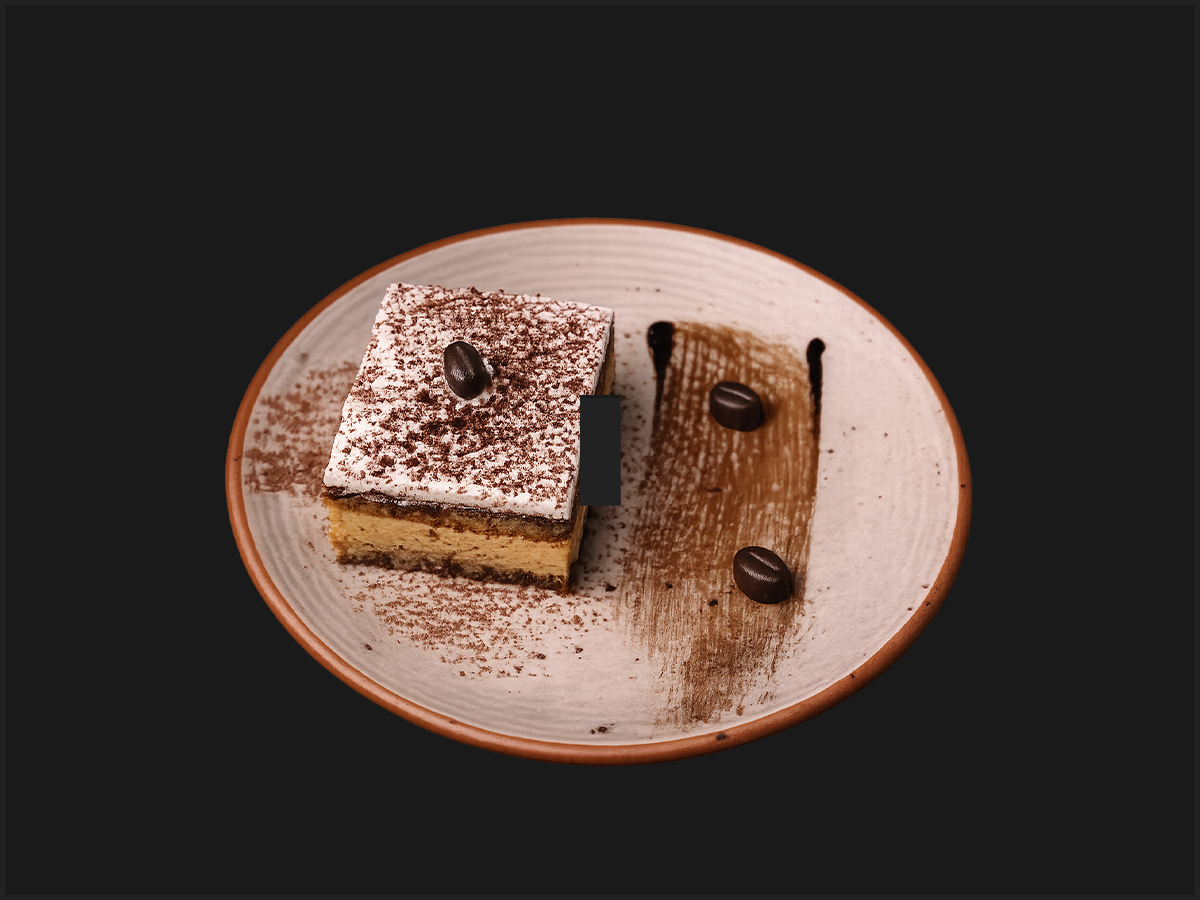 Classic Tiramisu with cocoa dust and coffee beans